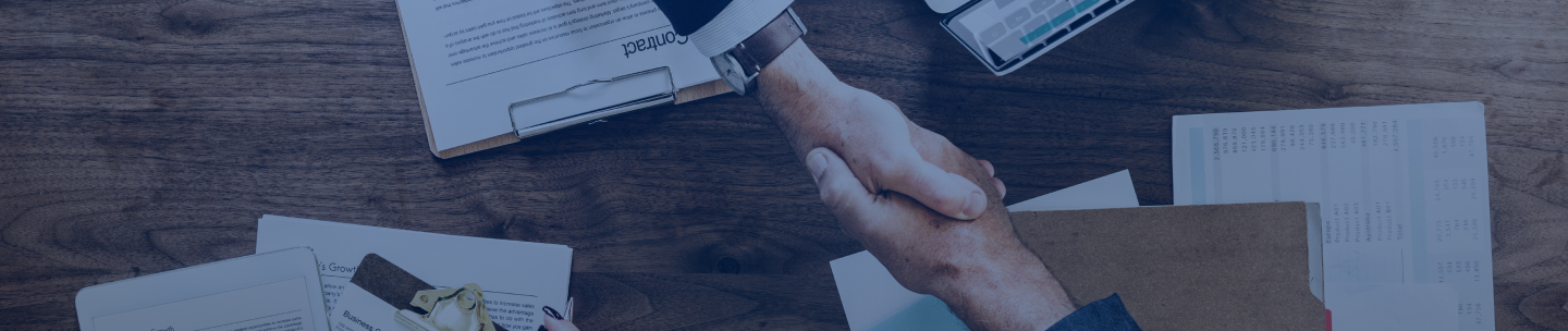 business people shaking hands together